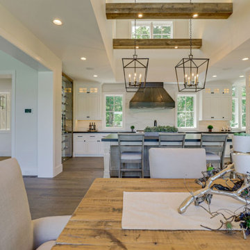 Custom Reclaimed Wood Table and Beams in Open Kitchen