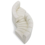 Meridian Furniture - Arc Vegan Leather Upholstered 4-Pc. Facing Modular Sectional, Cream - Unleash modern opulence with the Arc Vegan Leather 4pc. Sectional. Crafted for the modern connoisseur, this Sectional injects an air of refined luxury into any space. Its sleek silhouette, upholstered in supple cream vegan leather, exudes timeless sophistication while the deep channel tufting adds textural intrigue, further elevating the chair's visual appeal. The modular design makes it a versatile chameleon, effortlessly adapting to your evolving needs and preferences. Whether you envision it gracing a chic living room corner, basking in the glow of a bedroom window, or adding a touch of drama to a home office, the Arc seamlessly complements your unique interior aesthetic.