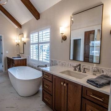 Luxury Spa Bathroom with Natural Warm Vanities, Quartz Countertop, Tiled Shower