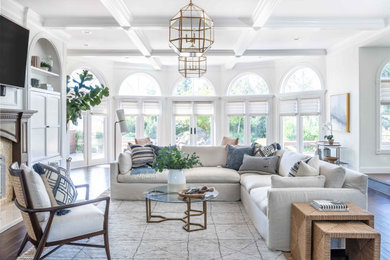 Family room - huge transitional open concept dark wood floor and brown floor family room idea in Sacramento with white walls, a standard fireplace, a stone fireplace and a wall-mounted tv