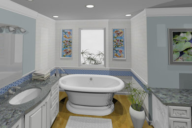 Large asian master white tile and ceramic tile porcelain tile freestanding bathtub photo in Portland with an undermount sink, raised-panel cabinets, white cabinets, granite countertops, a two-piece toilet and blue walls