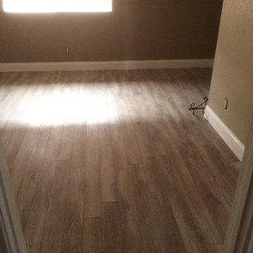 Delaware Bay Driftwood 10 mm laminate with attached underlayment