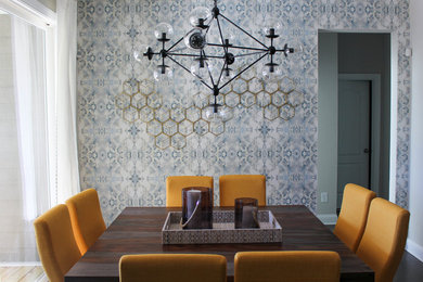 Inspiration for a mid-sized transitional open plan dining in Raleigh with grey walls and dark hardwood floors.