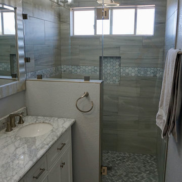 BATHROOMS TILE SHOWER WITH GLASS DOOR