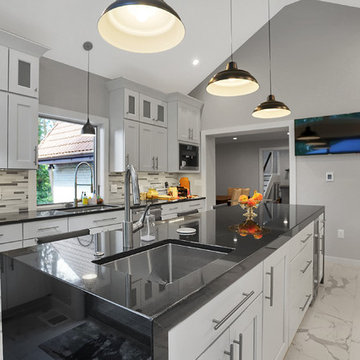 Absolute Black Kitchen with Waterfall Edge