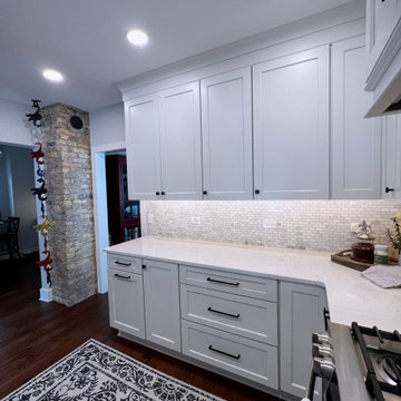 Quaint Kitchen with a Hint of Exposed Brick