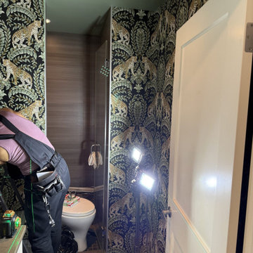 Leopard Botanical Wallpaper in a Full Bathroom