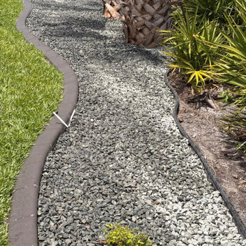 Elegant Landscape Renovation & Decorative Rock Installation