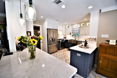 This is an example of a transitional kitchen in Houston.