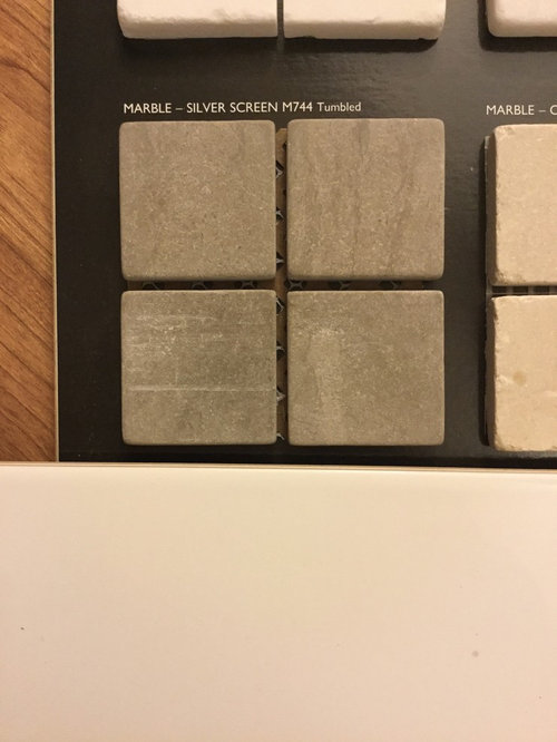 Tumbled marble or matte glazed porcelain shower floor tile???