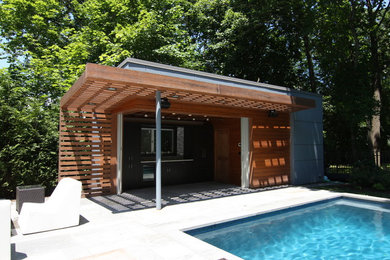 Small contemporary one-story concrete fiberboard flat roof idea in New York