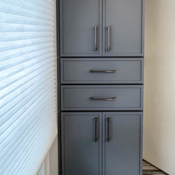 Primary Suite Remodel with Blue Cabinetry and Calacatta Miraggio Duo Quartz