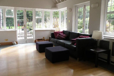 Example of a transitional home design design in London