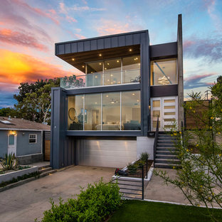 Contemporary black two-story metal exterior home idea in Los Angeles