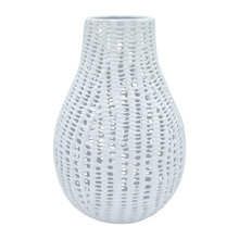 white ceramic vases