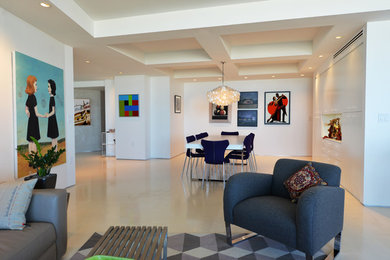 Minimalist marble floor dining room photo in Miami with white walls