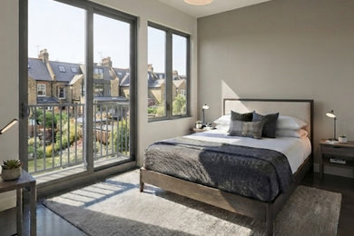 Design ideas for a master and grey and black bedroom in London with beige walls, dark hardwood flooring and black floors.