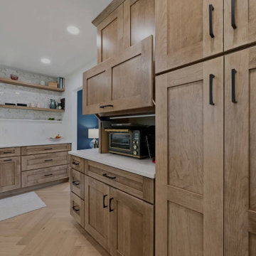 Warm Cherry Kitchen and Powder Room Remodel with Waterfall Island in Herndon, VA