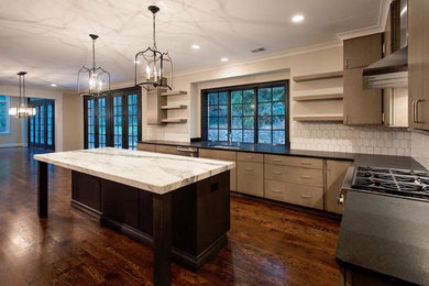 Mid-sized minimalist u-shaped dark wood floor eat-in kitchen photo in Philadelphia with a double-bowl sink, flat-panel cabinets, gray cabinets, marble countertops, white backsplash, mosaic tile backsplash, stainless steel appliances and an island