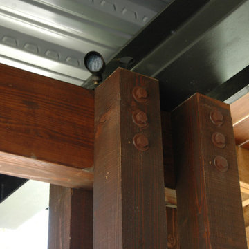 Expressed structure - post, beam, pan deck supporting upper terrace