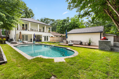 Eclectic pool photo in Houston