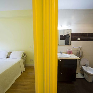 Vista de dormitorio de la reforma integral realizada en piso de Pozuelo de Alarc
