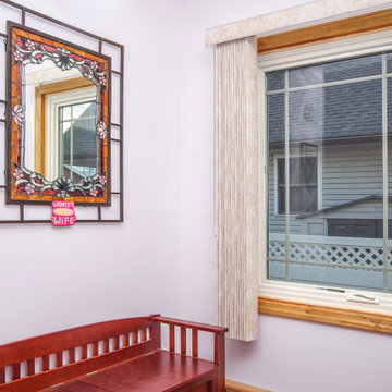 Sitting Area at the Bottom of the Stairs with New Windows