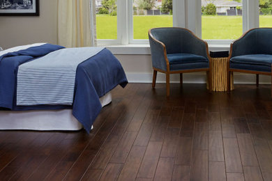 Bedroom - traditional dark wood floor and brown floor bedroom idea in Raleigh