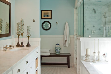 Inspiration for a traditional bathroom in Los Angeles with an undermount sink, white cabinets and an alcove shower.
