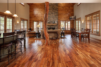 Example of a mountain style family room design in Other