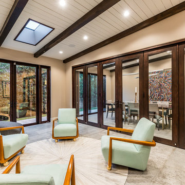 Interior Bi-Fold Doors Separate Formal Sitting Room from Dining Room