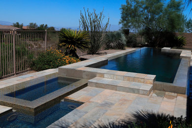 Transitional backyard pool photo in Las Vegas