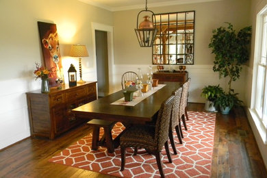 Arts and crafts medium tone wood floor kitchen/dining room combo photo in Other with beige walls and no fireplace