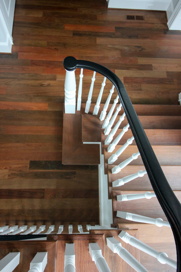 Powerful Impression by Floating Staircase in Suburban Foyer