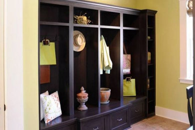 Mid-sized ceramic tile foyer photo in Miami with yellow walls