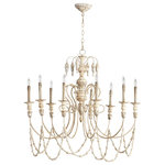 Cyan - Florine Nine-Light. Chandelier - Add a touch of traditional charm to your home with this lovely nine-light aged white chandelier. Romantic, curlicue supports and gorgeously draped beading help give this chandelier a dramatic silhouette. Persian White and Mystic Silver finishes, help give this fixture a faux-vintage look. Candlewax-inspired details help heighten this air of nostalgia. The Florine Nine Lt. Chandlr by Cyan. Cyan Designs combines unique designs with high-end materials to bring you the very best home decor in the business. When you order a product engineered and manufactured by Cyan Designs, you're guaranteed to get a product that is built to last for years and years to come. This product will come in ship-safe packaging materials and will sure to impress!