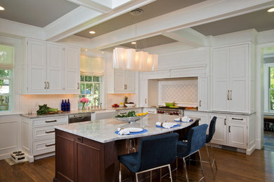 Kitchen - large transitional medium tone wood floor kitchen idea in Boston with a farmhouse sink, beaded inset cabinets, white cabinets, quartzite countertops, white backsplash, stone tile backsplash, stainless steel appliances and an island