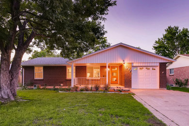 Mid-sized transitional red one-story brick exterior home photo in Denver with a shingle roof