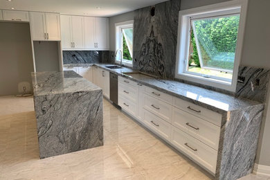 Contemporary kitchen with granite countertop and full backsplash