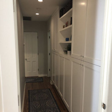 Keep It White for A Narrow Yet Uncluttered Corridor
