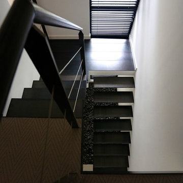 Floating stairs with triangular treads