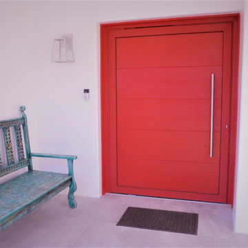 Custom Red Statement Pivot Entry Door