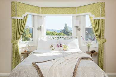Example of a mid-sized classic guest carpeted bedroom design in San Diego with white walls and no fireplace
