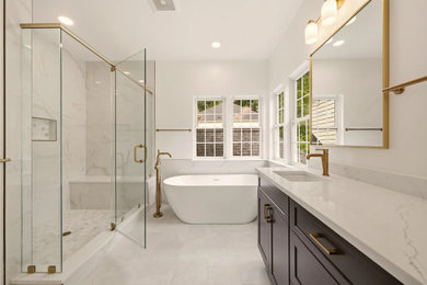 Mid-sized transitional white tile and porcelain tile porcelain tile, beige floor and double-sink bathroom photo in DC Metro with shaker cabinets, blue cabinets, a bidet, white walls, an undermount sink, quartz countertops, a hinged shower door, white countertops and a built-in vanity