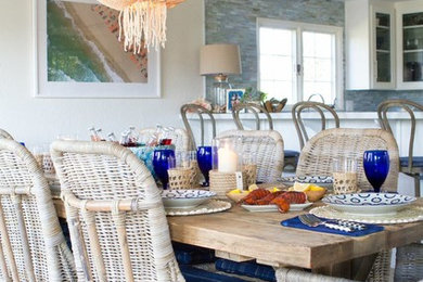 Kitchen/dining room combo - mid-sized transitional light wood floor kitchen/dining room combo idea in New York