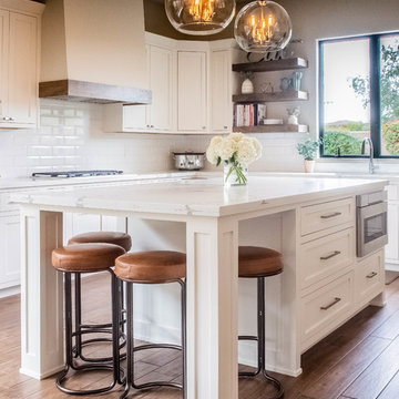 All-new white kitchen cabinetry and kitchen island