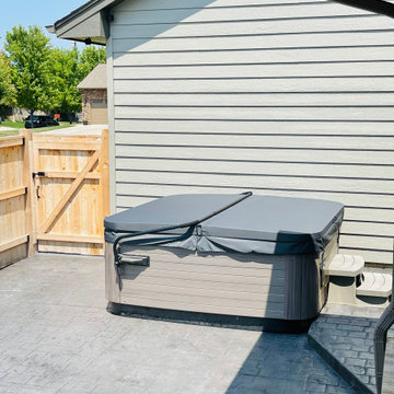 Custom Cedar Covered Deck with Built-In Stone Fireplace and Patio — Sioux Falls