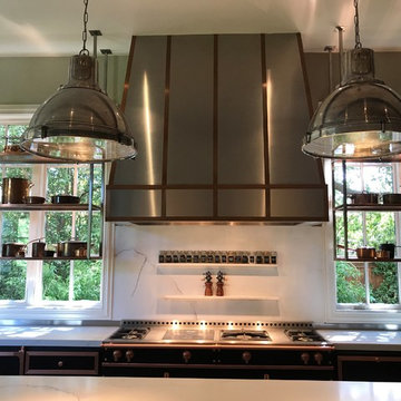 Stainless and copper vent hood, hanging shelves, backsplash, table base, amazing