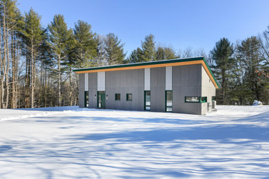 Photo of a modern house exterior in Boston with a lean-to roof.