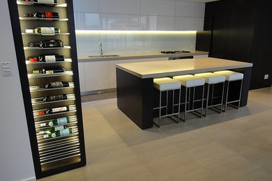 Photo of a large modern kitchen in Perth with porcelain floors.